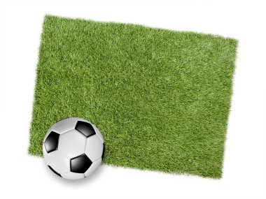 Yeşil çim bir yama üzerinde futbol ya da futbol topu