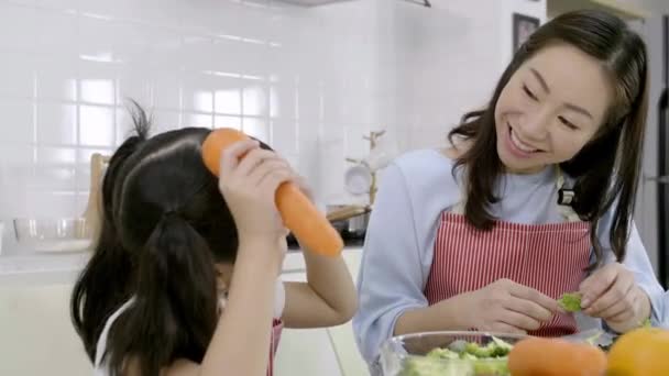 Happy Asian Family Close Mother Child Daughter Preparing Salad Cutting — Stock Video