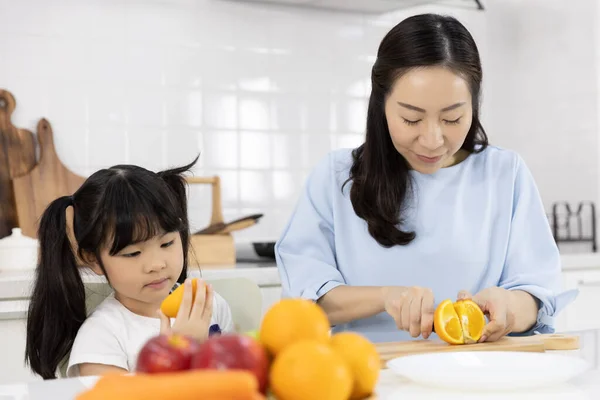 Happy Asian Family Little Girl Enjoy Mother Preparing Vegetables Fruit — Stock Photo, Image