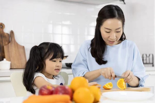Happy Asian Family Little Girl Enjoy Mother Preparing Vegetables Fruit — Stock Photo, Image