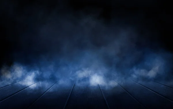 Empty street scene background with abstract spotlights light. Night view of street light reflected on water. Rays through the fog. Smoke, fog, wet asphalt with reflection of lights.