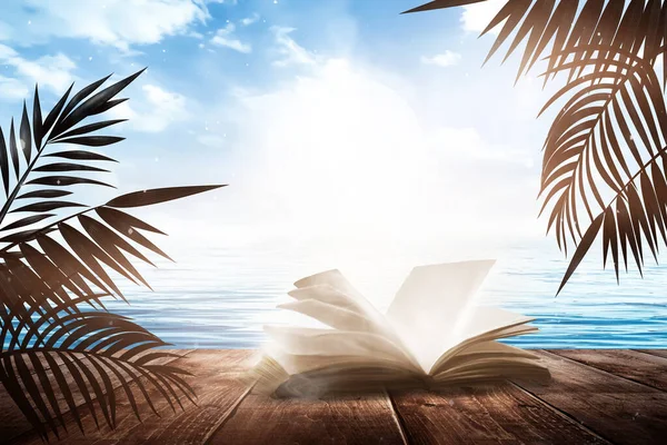 翻开一本关于日落大海晚景背景的书 棕榈树分枝 木制桌子 露天海景 3D插图 — 图库照片
