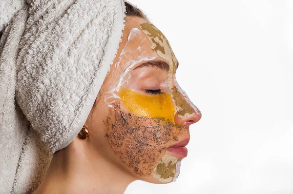 Woman with different masks on her face multi-masking — Stock Photo, Image