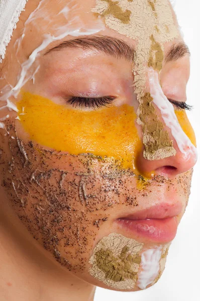 Woman with different masks on her face multi-masking — Stock Photo, Image