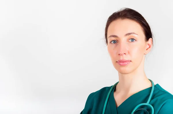 Portrait of young attractive doctor, surgeon, nurse with stethos — Stock Photo, Image