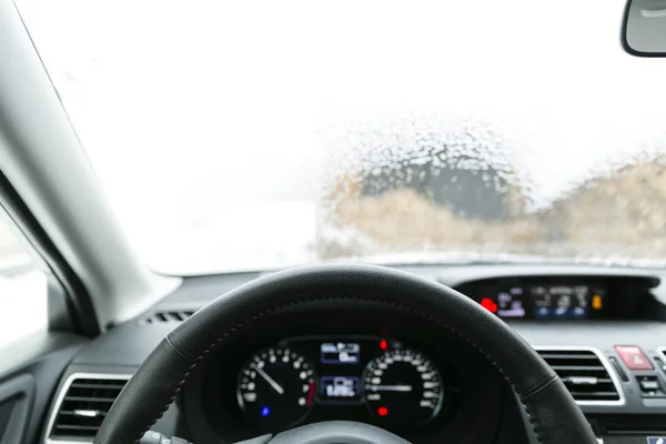 Defrosting ice from car windshield — Stock Photo, Image