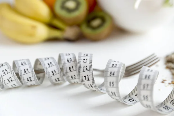 Healthy fruit,vegetables and measuring tape around the fork. Wei — Stock Photo, Image