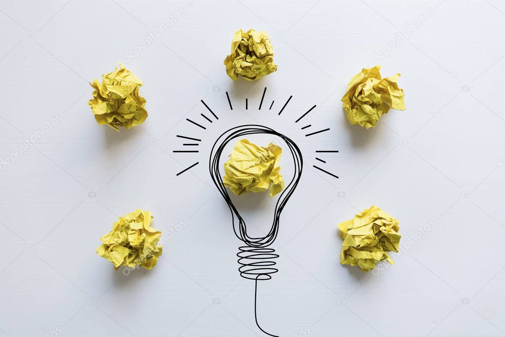 Creative idea. Concept of idea and innovation with yellow paper 