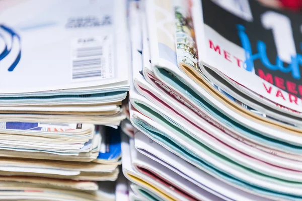 Assorted Magazines in Separate Piles — Stock Photo, Image