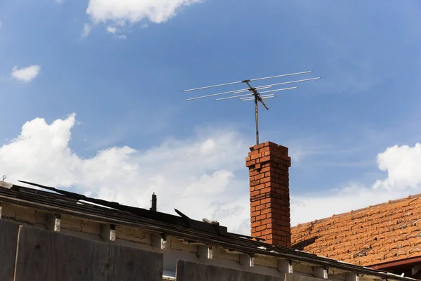 Residential Red Brick Chimney With TV Antenna Attached On Top — 스톡 사진