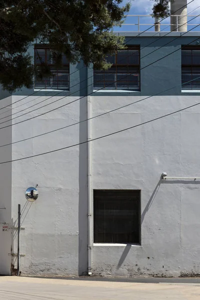 Industrial Street Scene With Circular Mirror For Turning Traffic — 스톡 사진