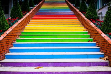 Stairs painted in rainbow colors clipart