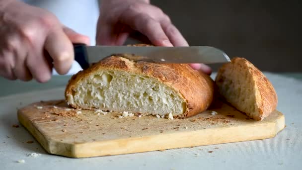 Chef Baker Cuts Fresh Italian Bread — Stock Video