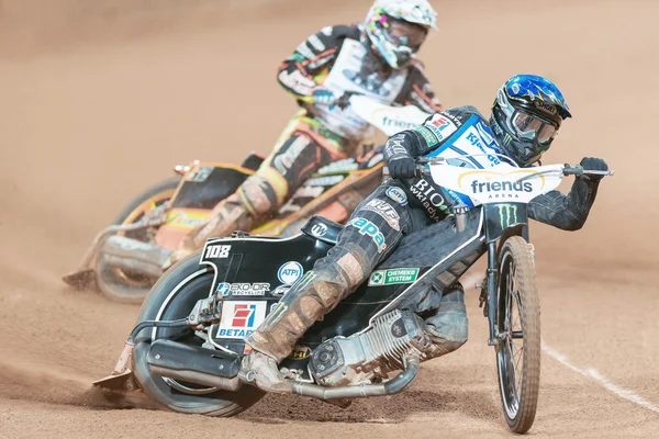 Tai Woffinden (GBR), що ведуть перед Jepsen Дженсен (Den) Стокгольм — стокове фото