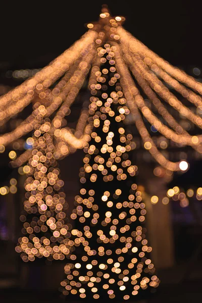 Lights defocused during christmas in city — Stock Photo, Image