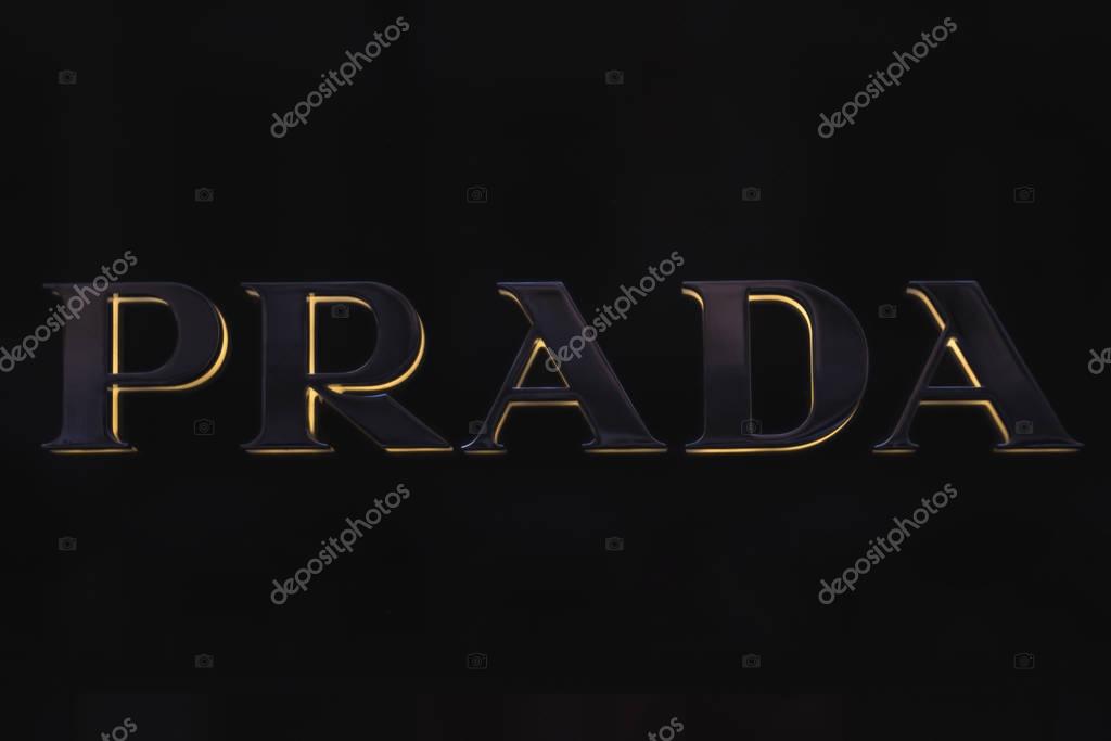 STOCKHOLM, SWEDEN - DEC 7, 2016: Black Prada sign with yellow highlights in a boutique in Stockholm.
