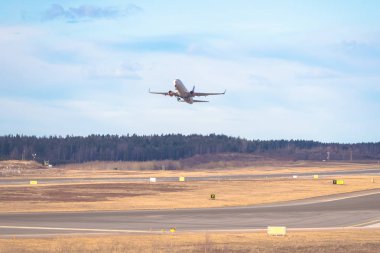 D sırasında Stockholm Arlanda (Arn) Havalimanı'ndan çıkış yapan yolcu uçağı