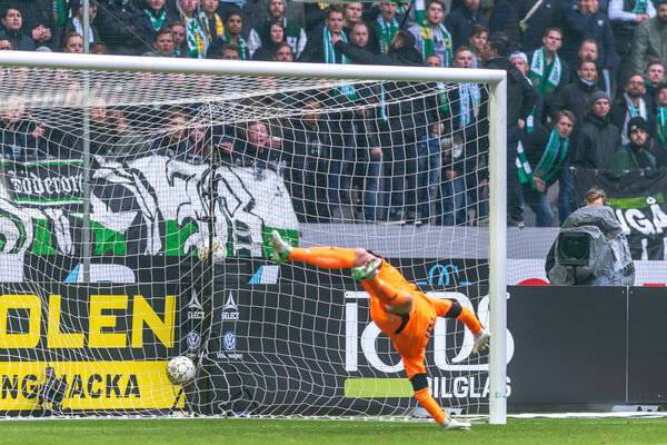 Nils Johansson scores at the derby match between AIK and Hammarb