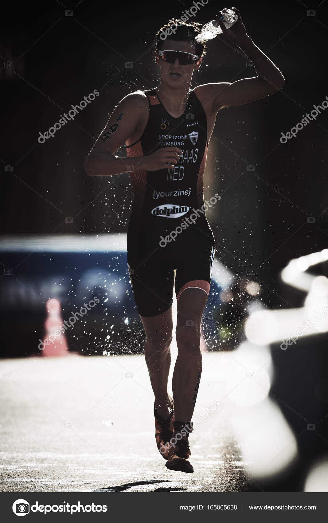 Menno Koolhaas (NED) running trough the waterstation at the ITU Stock