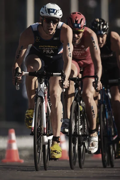 Dorian Coninx (FRA) leading a group of triathletes on bike in th — Stock Photo, Image