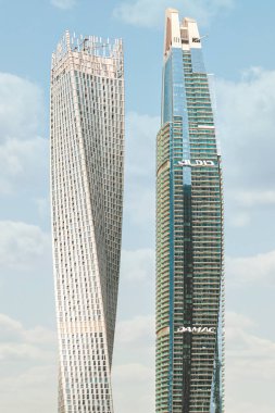 Yanındaki Dubai Marina 'daki Cayan kulesi Damac Residenz.