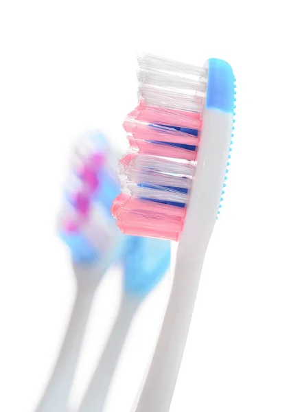 Tres cabezas de cepillo de dientes —  Fotos de Stock