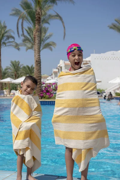 Happy Young Boy Girl Covered Towels Swimming Pool — стокове фото