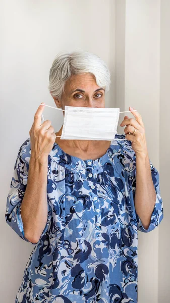 Woman wearing protective mask against corona virus