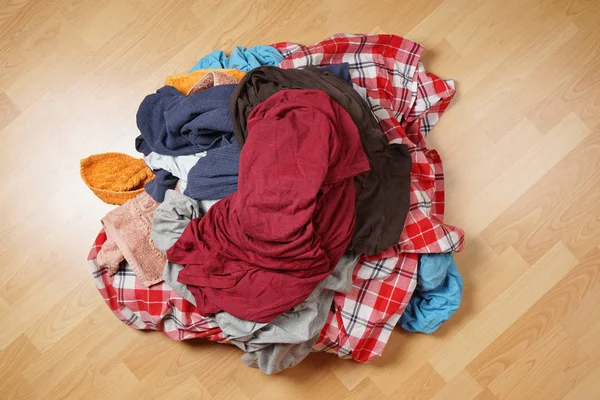 dirty laundry pile on floor