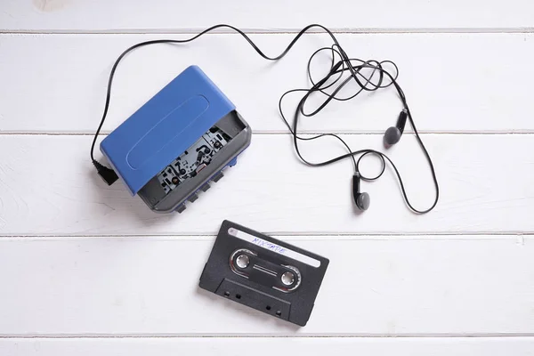 Walkman with earphones and mixtape — Stock Photo, Image