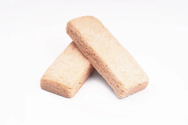 Zwei Shortbread Fingerkekse oder Kekse auf weißem Hintergrund — Stockfoto