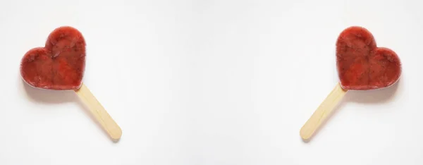 ハート型のアイスロリーとアイスポップのバナー — ストック写真