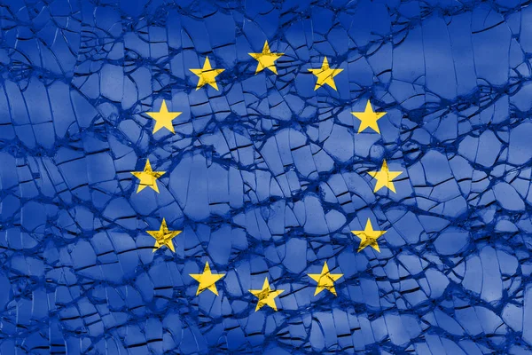 粉粉になったガラス質の欧州連合(EU)の旗 ストック画像