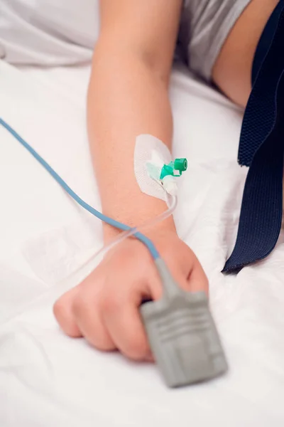 Iv fluid, intravenous with sodium chloride applying to the patient hand in the hospital.