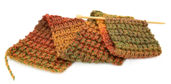 Knitting a scarf in fall colors — Stock Photo, Image