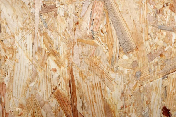 Temné a světlé dřevěné proužky v flakeboard list stavební materiál — Stock fotografie