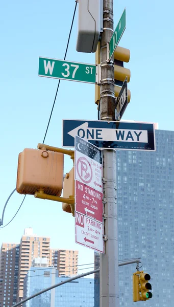 Street signs at West 37th Street and 10th Avenue — Stock Photo, Image