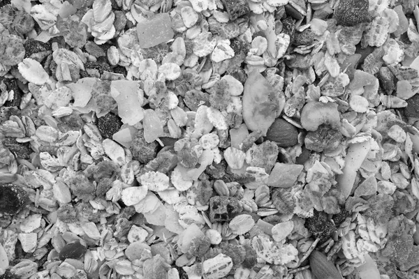 Achtergrond van muesli - granen met zaden, fruit en noten — Stockfoto