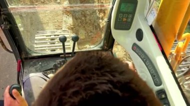 UHD buldozer kabin sallamak ateş Sony 4 k yol inşaat sitede çalışma sırasında