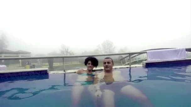 Couple Relaxing Spa Water Pool Outdoors — Stock Video