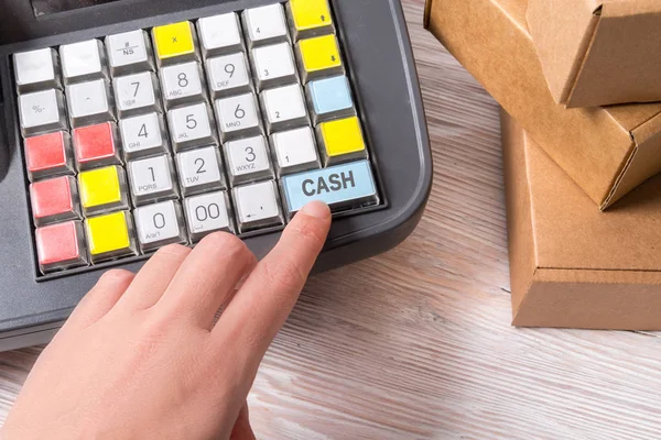 Woman hand working with Electronic Cash Register