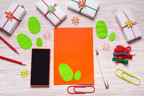 Easter concept empty list on wooden desk