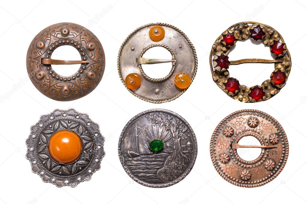 Set of antique metal Latvian national style brooches, Isolate