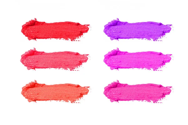 Palette von rosa Lippenstiften, isoliert — Stockfoto