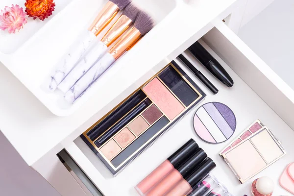 Set of different cosmetics in drawer box — Stock Photo, Image