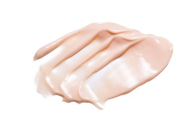 Yüz için temel izleri var. Beyaz üzerine kozmetik izole sıvı