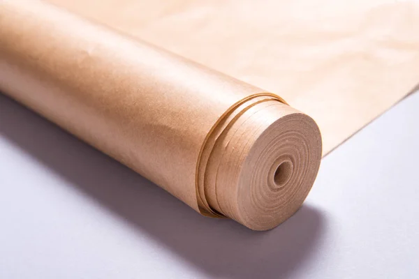 Roll of baking paper on grey background — 스톡 사진