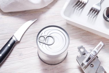 Tin Canned meal on kitchen table, top view