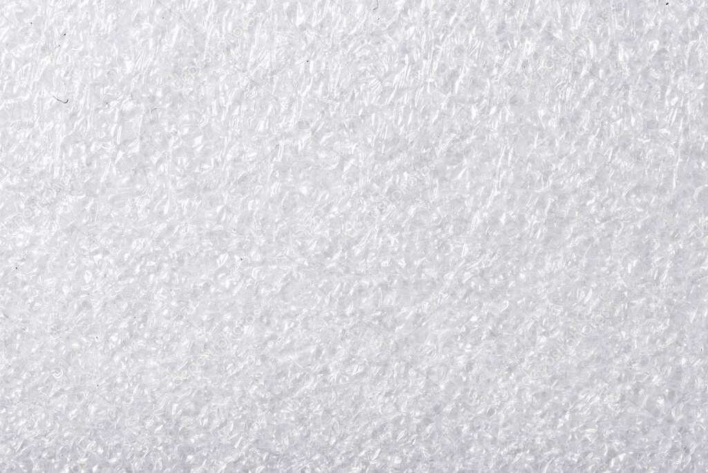 White, textured foam background texture, close up