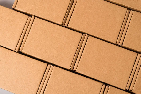 Kahverengi Karton Kutular Seti Desenli Arka Plan — Stok fotoğraf